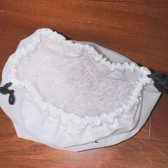 Authentic - CHANEL white cotton canvas drawstring pouch...